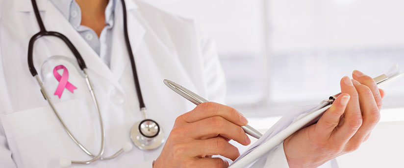 Doctor conducting breast cancer test 