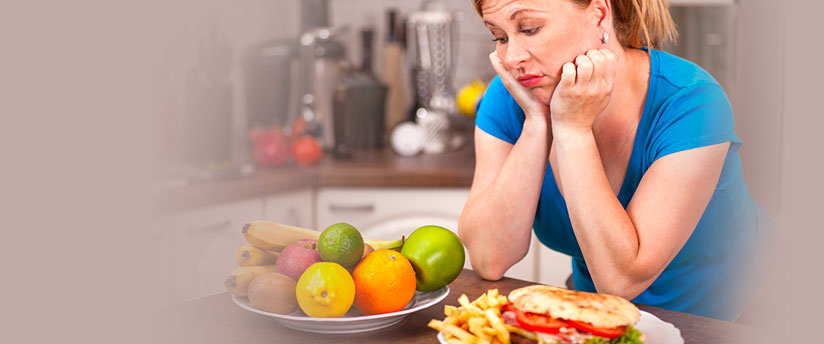 Woman looking at fruits